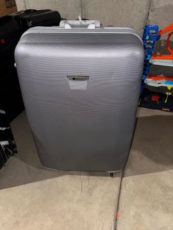 Silver large suitcase