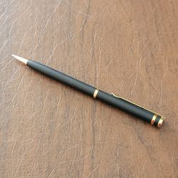 Vintage Colibri classic  ballpoint ball point pen black with gold tone 
trim. Pre-owned, very good shape, please see the photos. NO INK, NO REFILL.