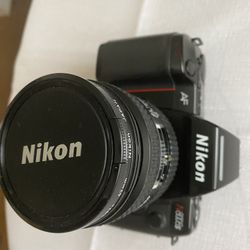 Nikon Camera With Lens
