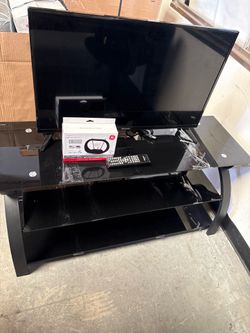 Tv 29 inch t.v stand used but super clean with had anthena