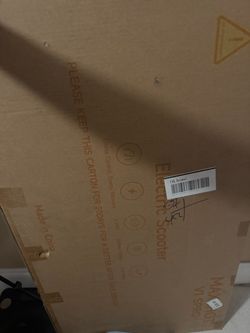 Brand new Electric Scooter in Box