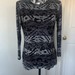 Unique top medium preowned. Shoulder pads, see through from the designs as shown in the pictures. 3/4 sleeves. Black/gray/silver color. Very unique fa