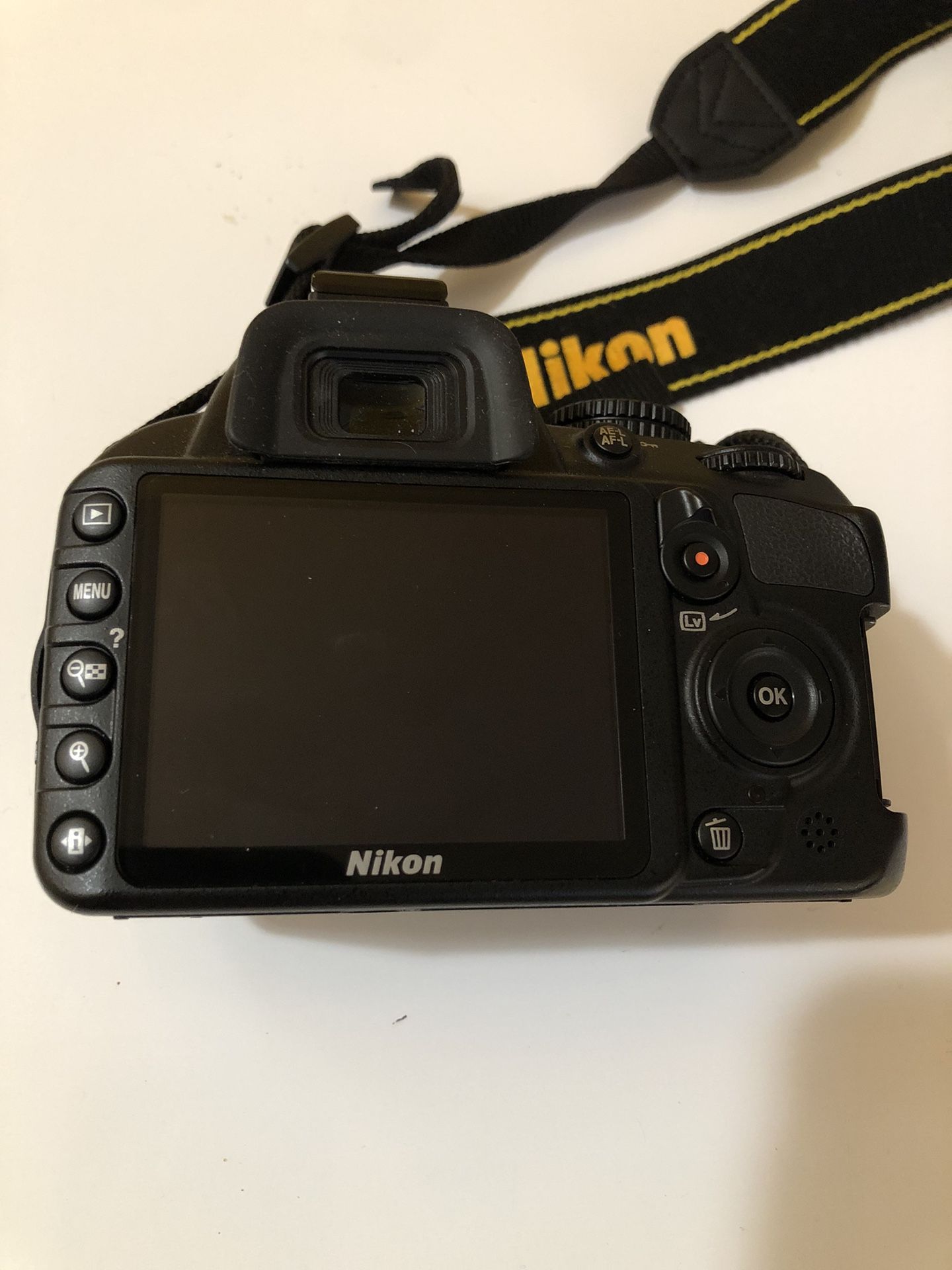 Nikon D3100 Camera In Good Condition . The cover to the SD card broke