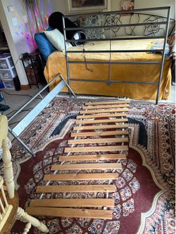 Full size IKEA metal bedframe with wood slates
