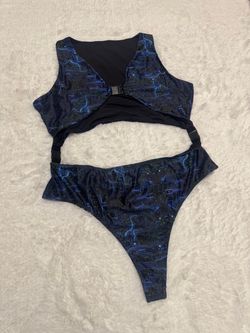 Circuit board electric blue pattern bodysuit with Cutout sides and front clasp detail create a striking look. Stretch fabric for comfortable wear. New