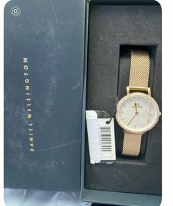 Daniel Wellington Petite Lumine Bezel Evergold watch