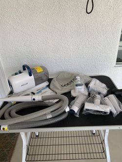 Complete Set Home Pet Grooming Oneisall Grooming Table and 8 in 1 Pet Grooming Vacuum and Dryer Kit.