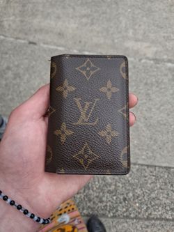 Louis Vuitton monogram pocket organizer.