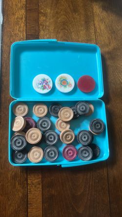 Carrom board game coins.