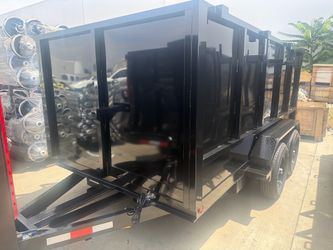 Smooth wall dump trailer 12 ft ! 2027