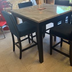 Brand new table in for stools for 699