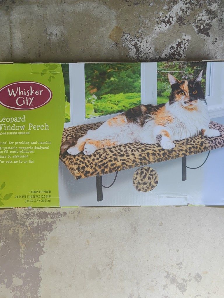 Brand new cat window perch securely mount in place. Leopard print size 23.75 L 14 W 10.5 H