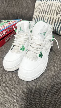 Green Jordan 4s 