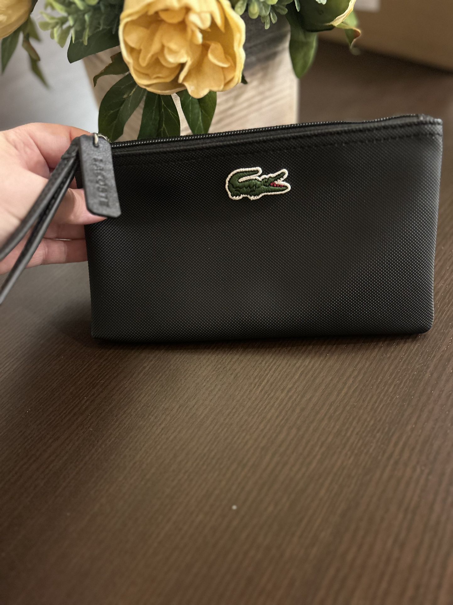 Price Is Firm!  New Never Used Lacoste Wristlet 8 1/2 Inches Wide By 5 Inches High Many Brand New Items In My Listings Cash Only