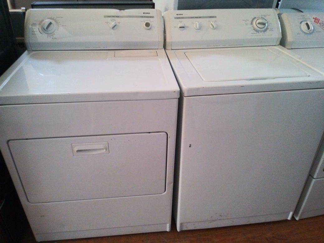 Kenmore top load washer and electric dryer set