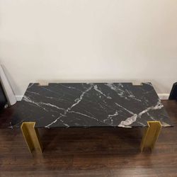 CB2 Alcide Rectangular Marble Coffee Table with cast aluminum brass legs