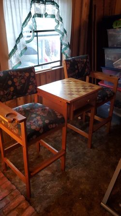 Antique level chairs for a pool Hall with playing board.