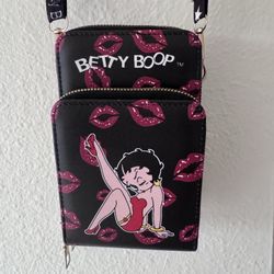 Betty Boop crossbody bag or wallet New with a black exterior and red lip print.  