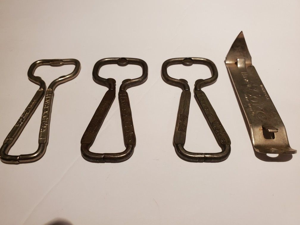 Lot of antique Coca Cola Coke bottle openers