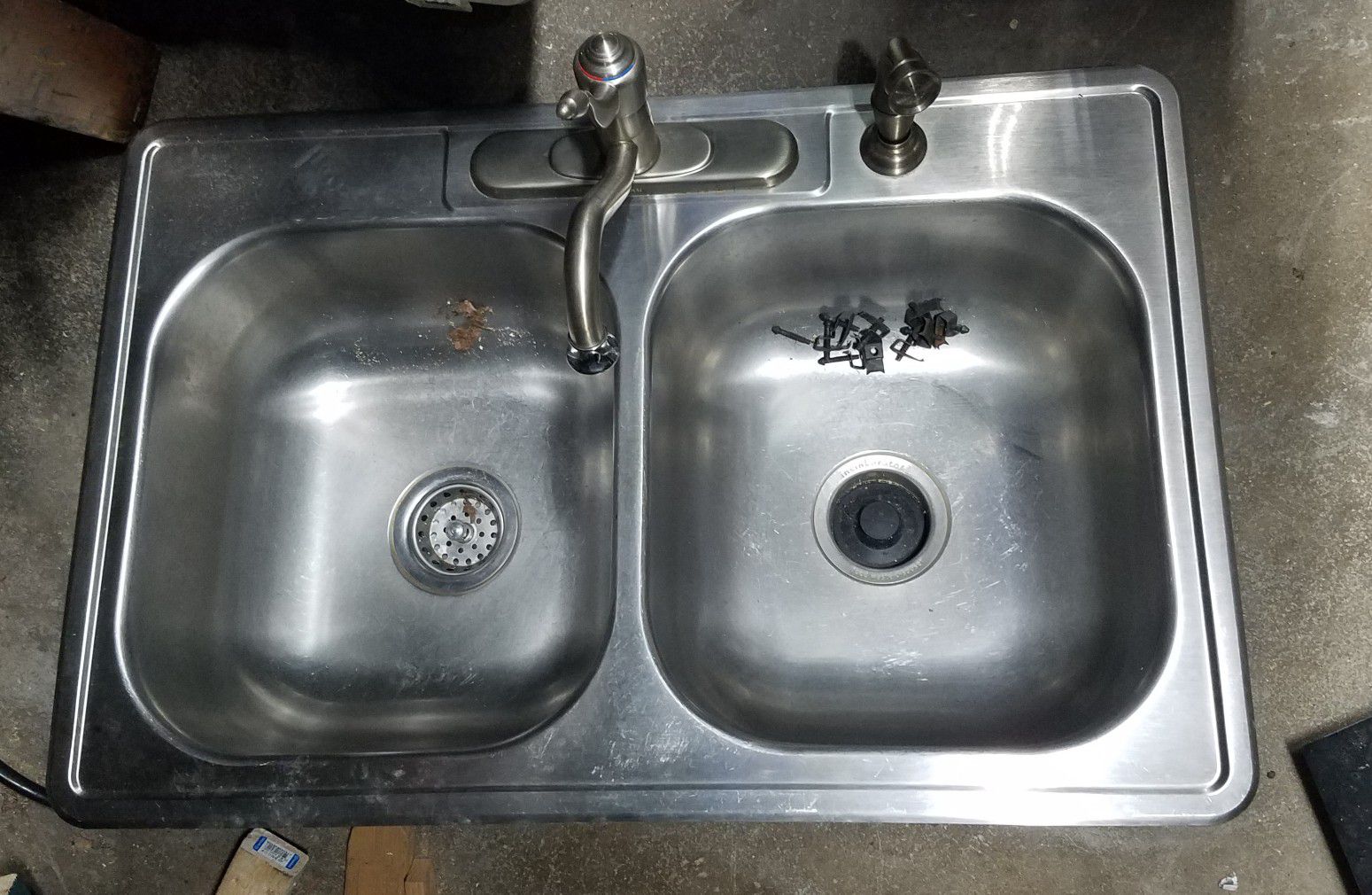 Kitchen sink w/ garbage disposal and faucet
