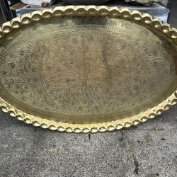 Very large brass serving platter in great shape. Would be something that would be used for a banquet, but it’s our so decorative. I don’t think it’s s
