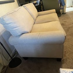 Beautiful Loveseat w/ storage Underneath