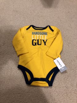 BRAND NEW: Carter’s onesie in size 9 Months