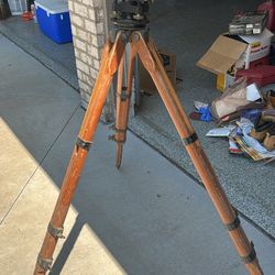 Antique Keuffel & Esser co. surveying transit level equipment with tripod