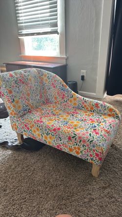 Kids chase chair