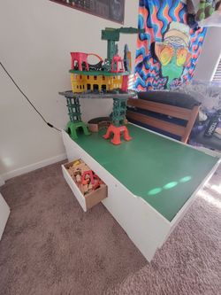 Train table with tracks and trains