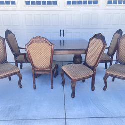 HUGE & HEAVY DINING TABLE AND FOUR CHAIRS