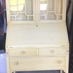Three-drawer  Antique secretary with drop-lid front and mirrored doors in a painted linen finish  On Wheels 