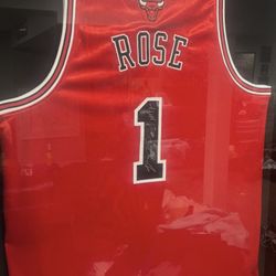 Derrick Rose Autographed Jersey With Frame