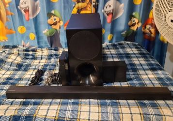 Samsung HW-M450 soundbar with a wireless subwoofer and Rear Speakers