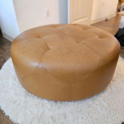 Article brand round leather ottoman.  Purchased for $800 new.
