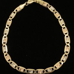 $900 Three Tone Gold Valentino Bracelet 