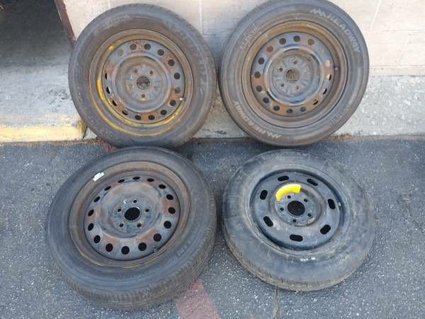 mismatched rims with tires. 5 on 4.5 lugs good rollers -