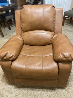 From Costco -Tan easy chair like new!