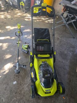 Ryobi law mover  and brush cutter with one 40V 6Ah battery and charger