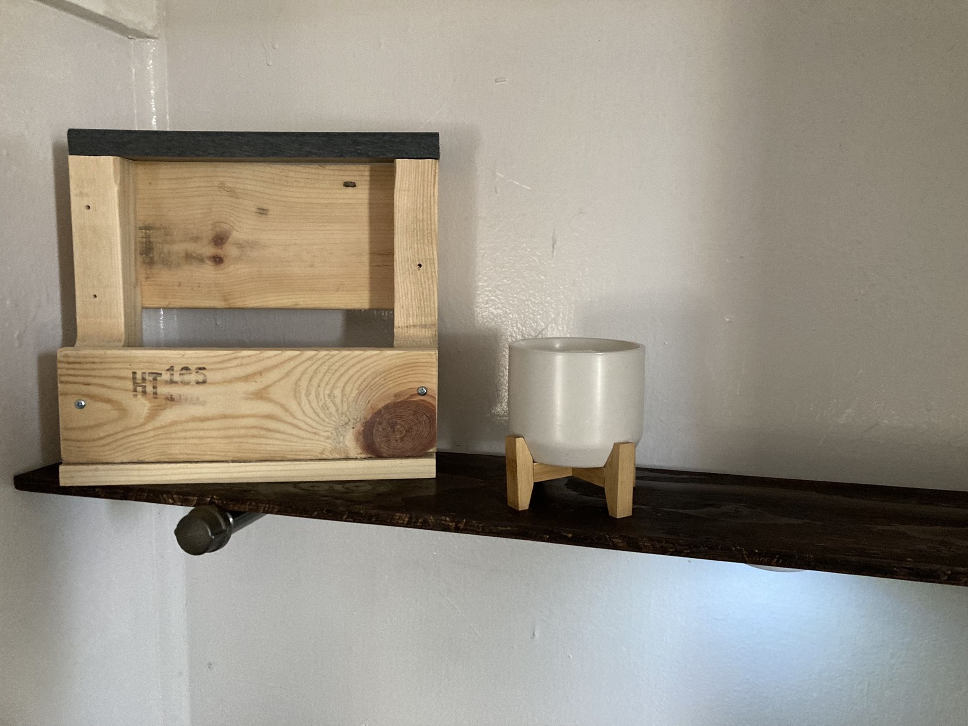 Grey Shelves, Flower Pot And Walnut And Metal Fan