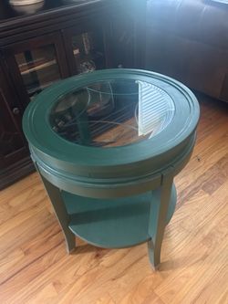 Dark green round solid wood side table