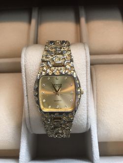 Woman’s used 18k gold plated watch