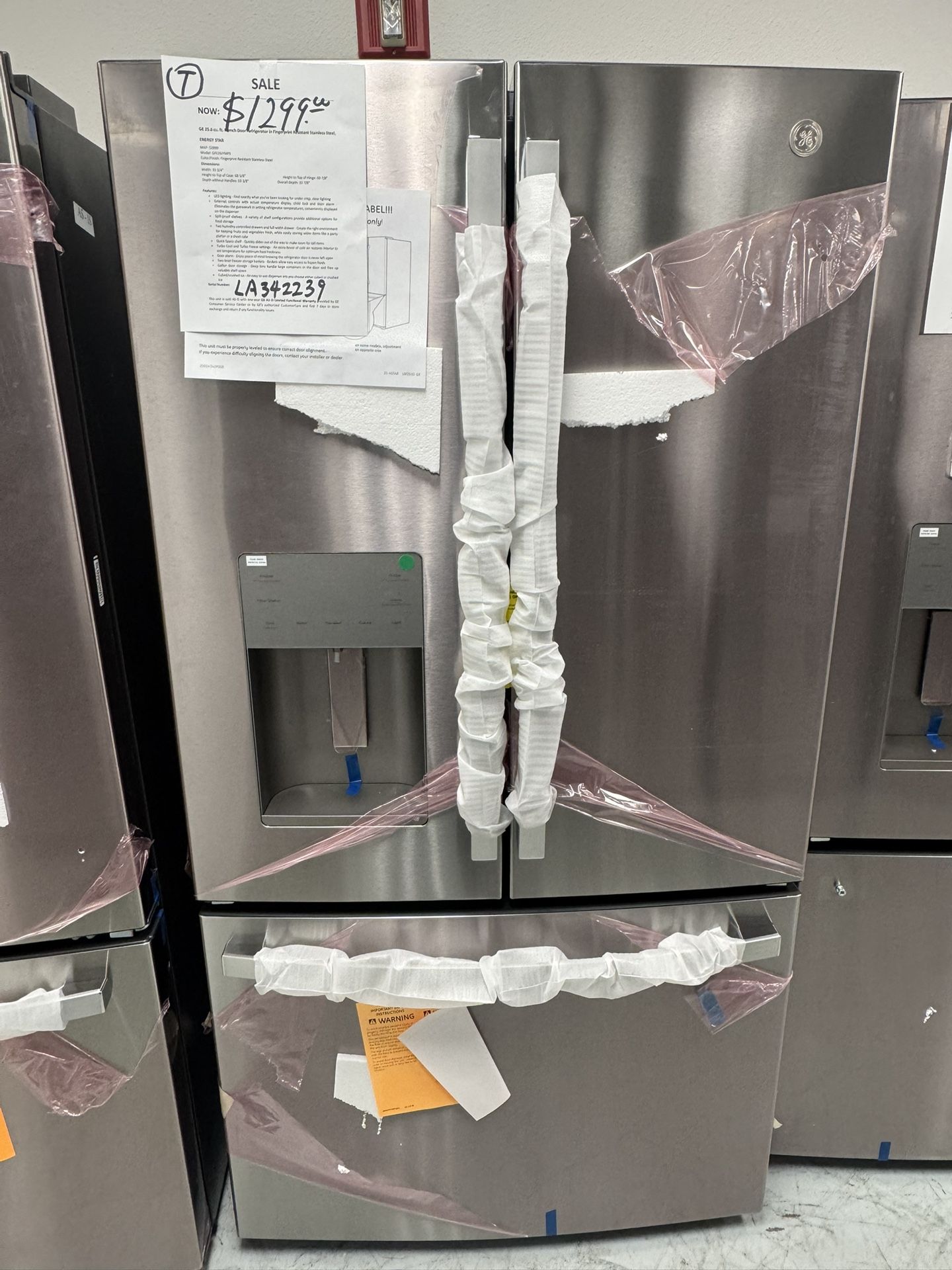 GE 26 Cu.ft French Door Refrigerator With One Year Manufacturing Warranty