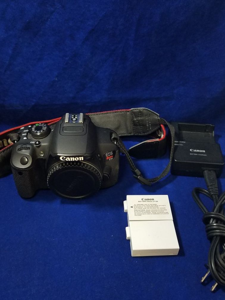 Canon EOS Rebel T5i DSLR Camera Body with 2 Extra Batteries and Charger