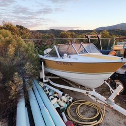 Boat With 88 Evinrude Motor .Looks Like It Will Float