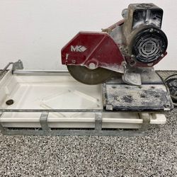 MK101 WET SAW NICE CONDITION 2 GUIDES !!