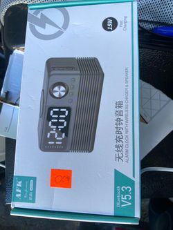 Alarm clock with wireless charger and speaker