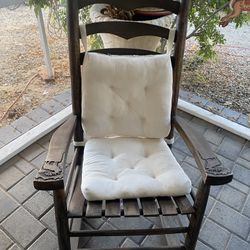 Cracker Barrel rocking chair, wood stained with cushions