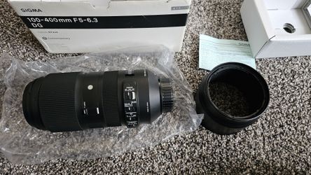 Sigma 100-400mm Like New Great Lens For Nikon Mount. Thought i would use it but just been sitting only used like 2xs i don't use As much zoom lens.