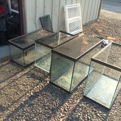 Four Aquariums All Different Sizes